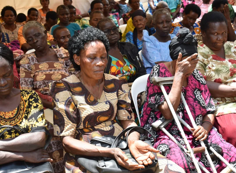 Women from the community seated together at a gathering